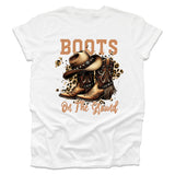 White t-shirt with cowboy boots and hat graphic and 'Boots on the Ground' text